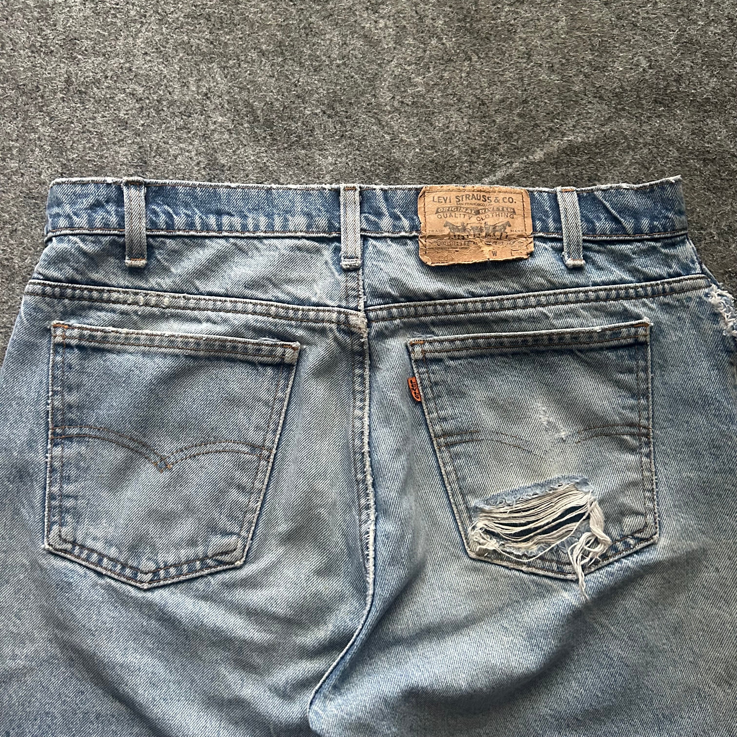 Vintage Distressed Orange Tab Levi’s Jorts