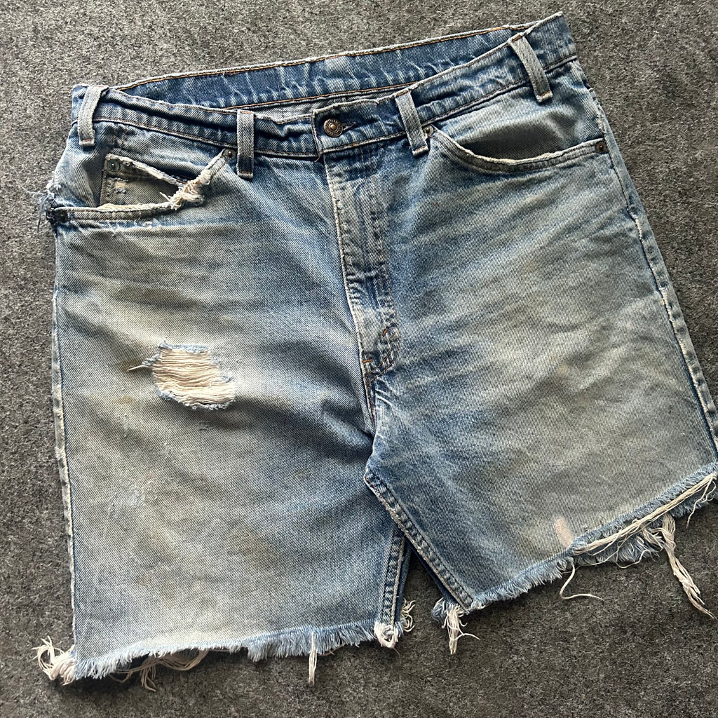 Vintage Distressed Orange Tab Levi’s Jorts