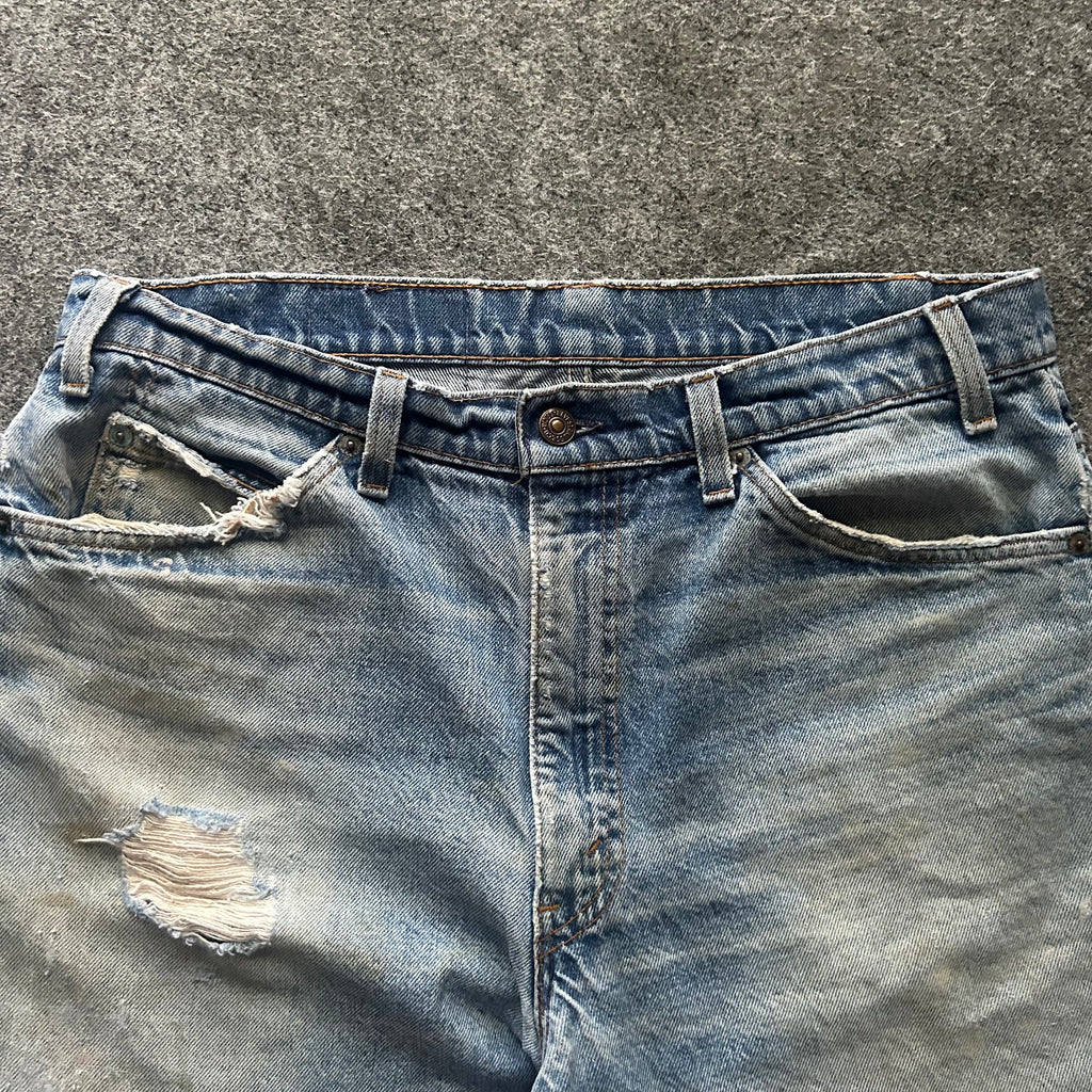 Vintage Distressed Orange Tab Levi’s Jorts